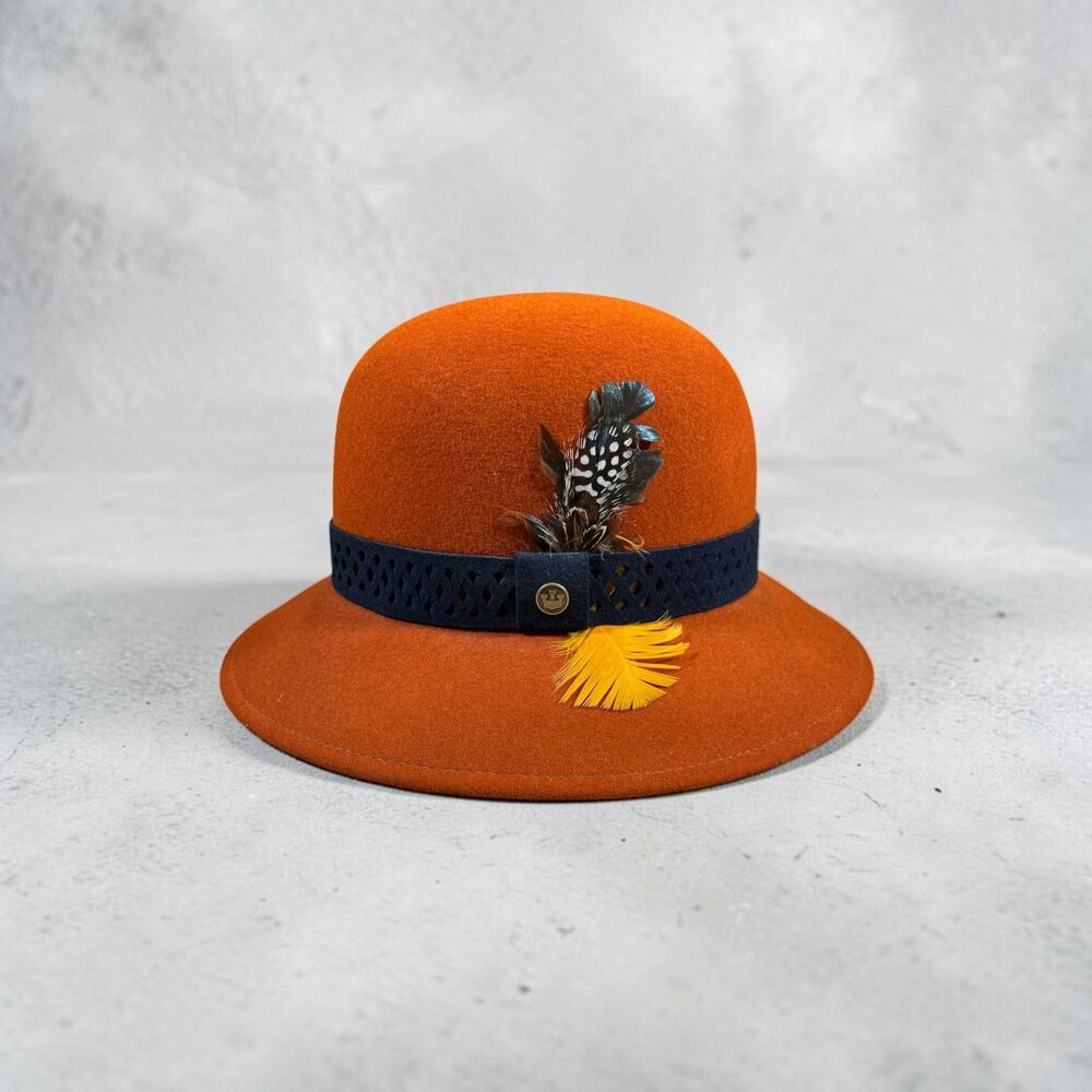 Woman's Goorin Bros Wool Hat size Medium burnt orange with feathers